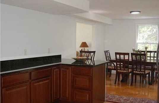 You can see the Kitchen and dining room in this picture. Right side of dining room is the sliding door to go to Patio