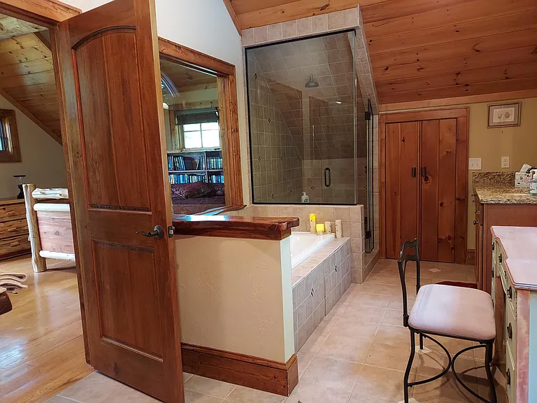 Top floor primary suite with jacuzzi tub