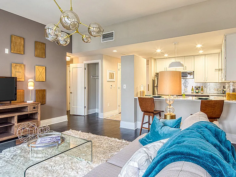 Living room opens into kitchen