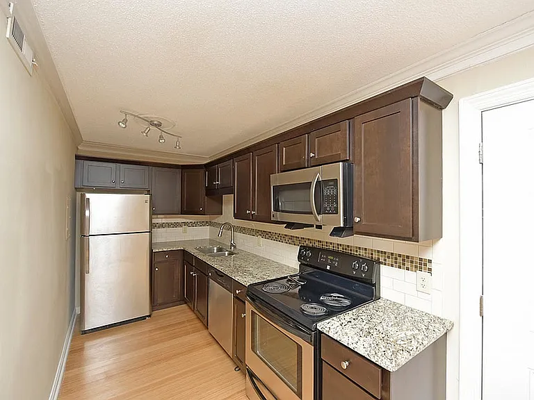 Experience culinary elegance in this chic and modern kitchen space.