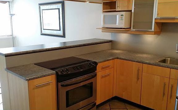 Open concept kitchen where you can cook delicious meals while talking to your guests.