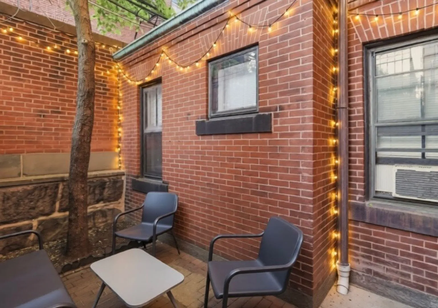 Back Bay Living with a Private Patio Oasis & Home Office Nook — Photo 1