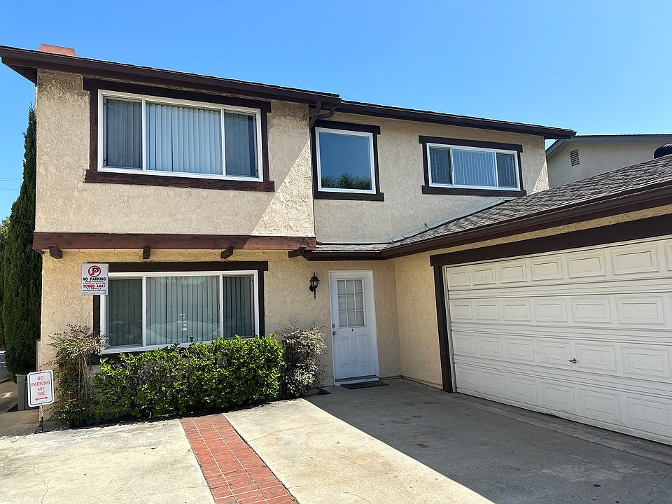 Front Door & 2 Car Garage