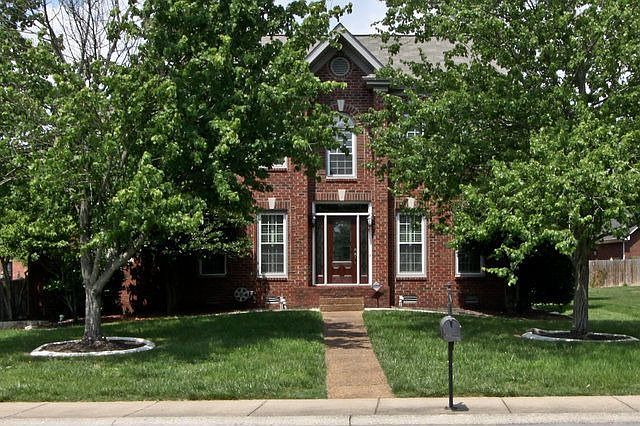 Beautifully treed front lawn -great curb appeal