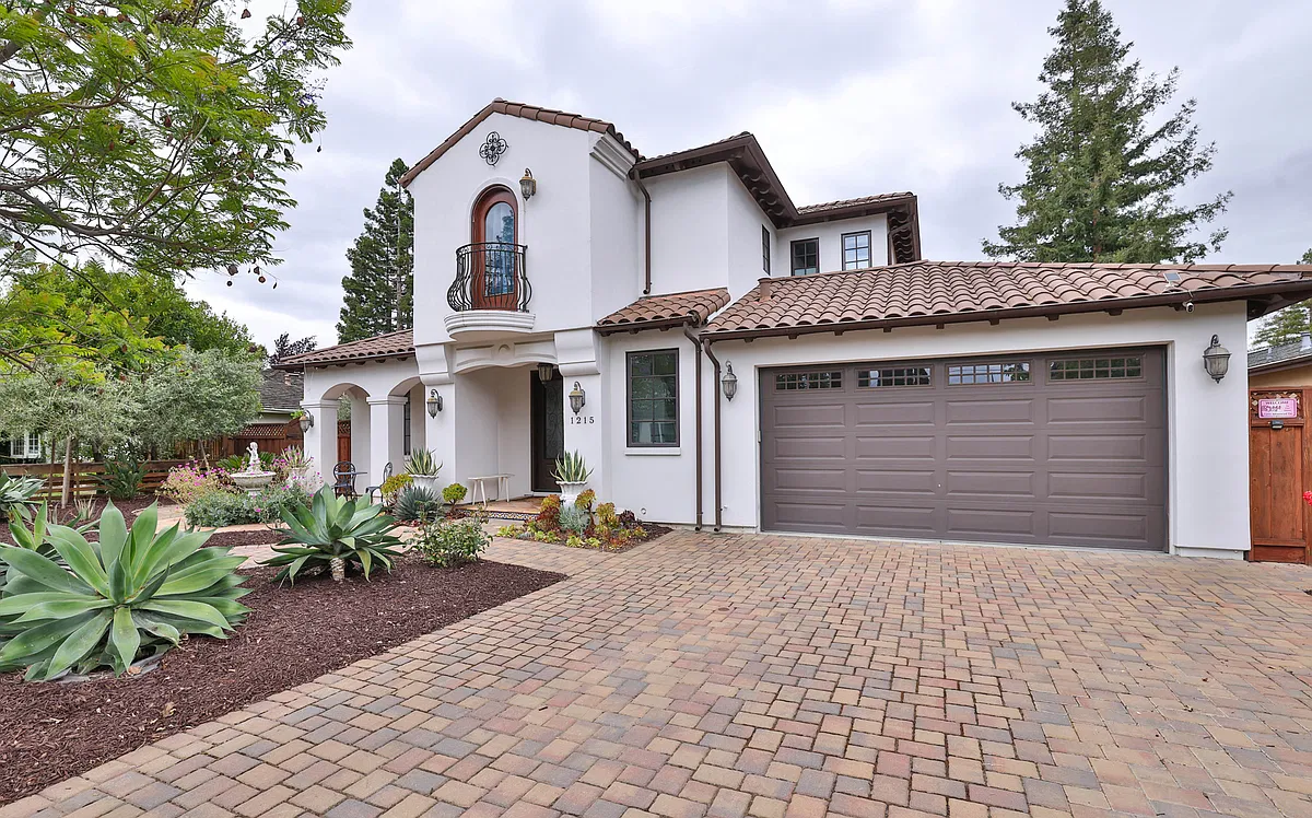 House front with two-car garage - 1215 Altamead Dr