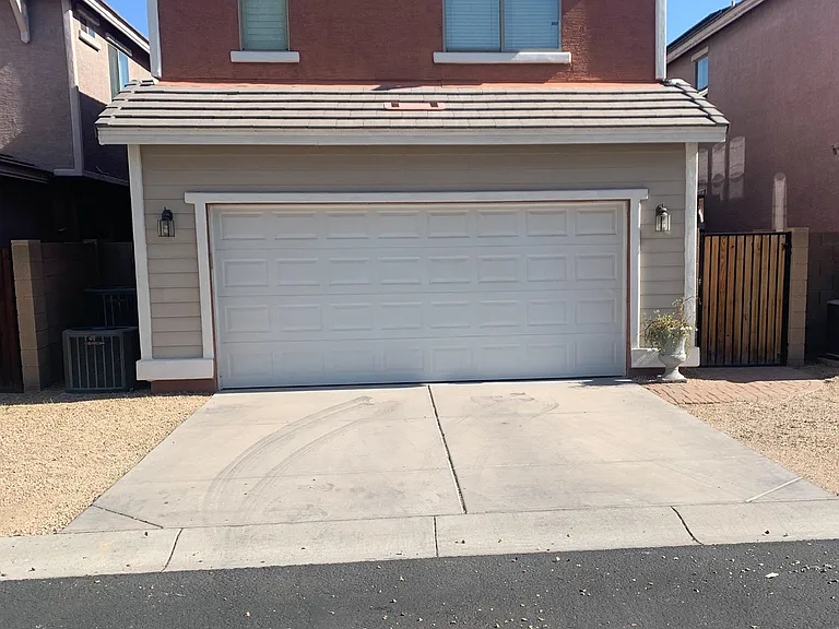 Rear-entry two-car garage with easy access and additional privacy.