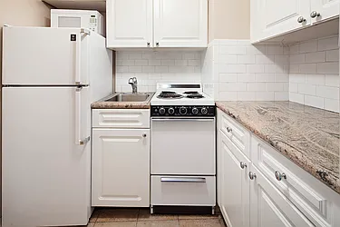 Sold by John J. Grogan & Associates