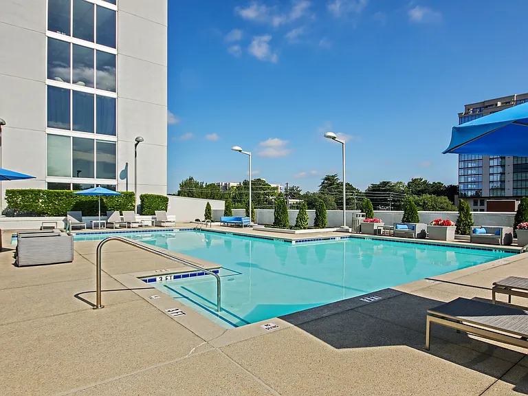 Lounge by the pool and enjoy skyline views
