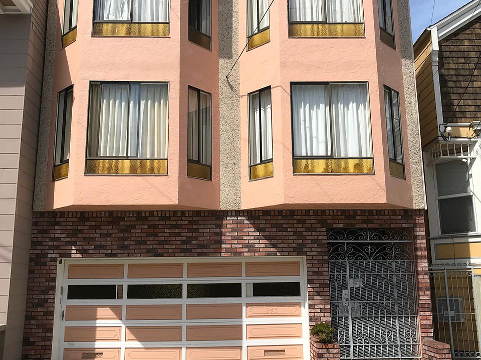 Exterior of 3-unit building.