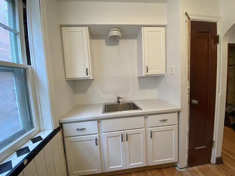 Shaker cabinets and sink.