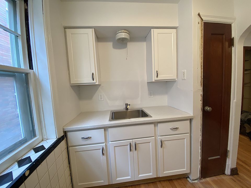 Shaker cabinets and sink.