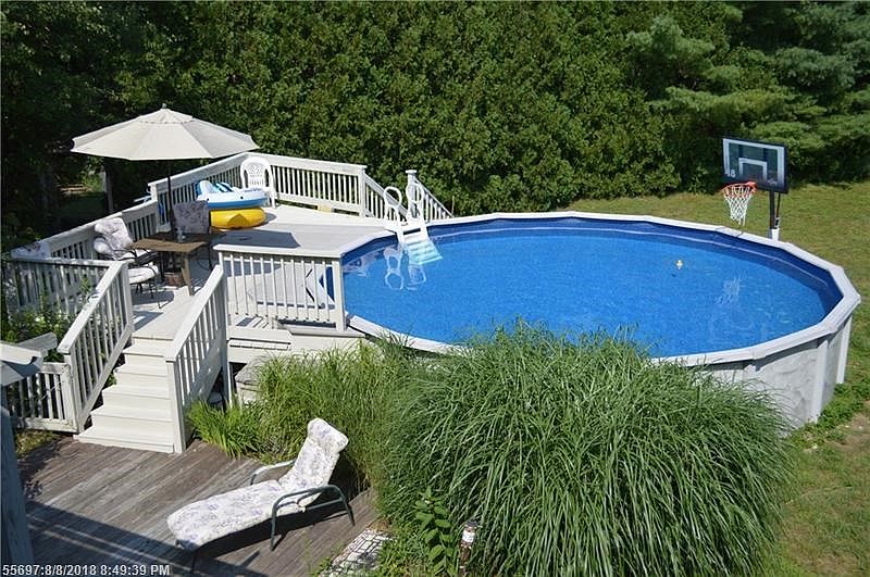 Come on in, the water fine in your over-sized above ground well maintained pool with ample decking for all. What could be better than your own ever ready back yard pool in this weather???