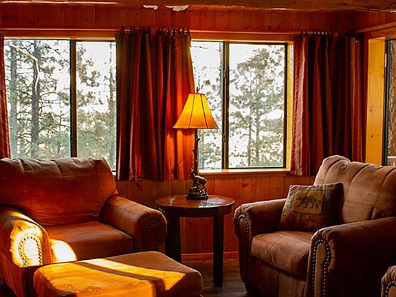 Livingroom with comfortable oversized furniture and views.