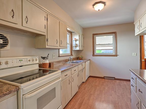 Includes dishwasher and electric stove