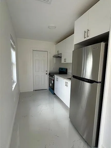 1101 NW 26th St — Photo 6