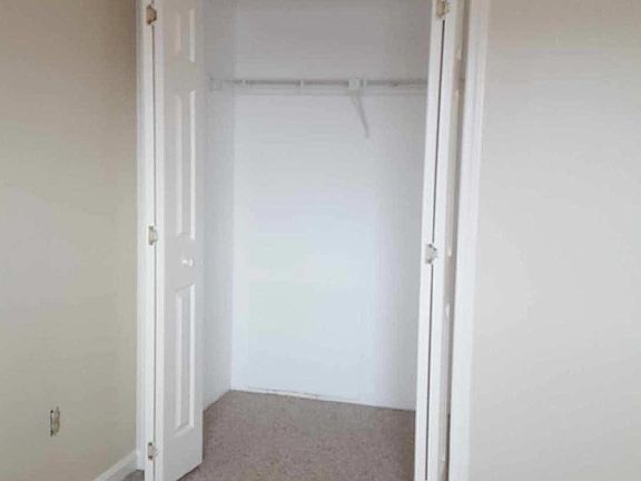 Freshly painted with laundry in building