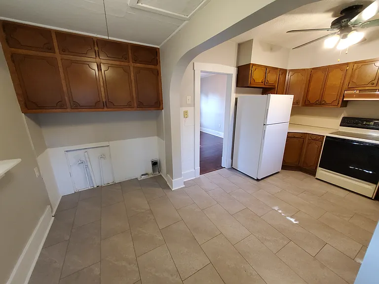 Laundry and Kitchen area. We provide a washer and dryer.