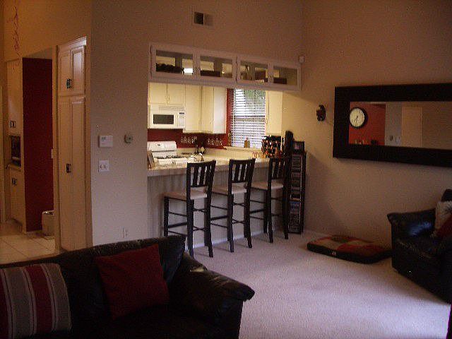 view from Tv Room into Dining and kitchen