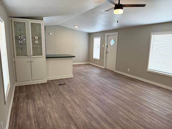 Entrance view to living room and kitchen