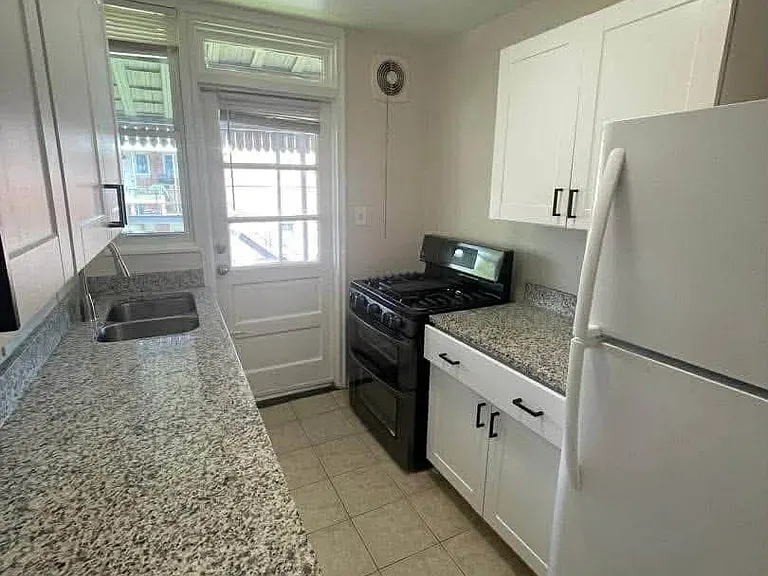 Kitchen (door leads to covered balcony/patio)