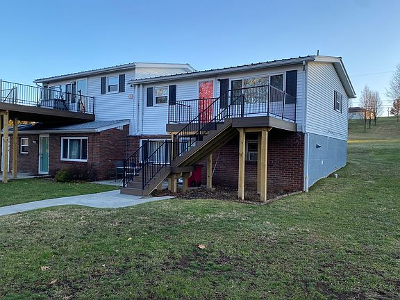 Front of building. The unit available is lower left. Green door.