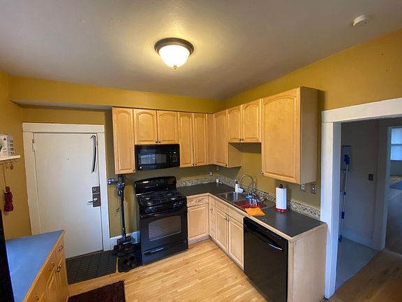 Updated kitchen with loads of storage and modern appliances including dishwasher and side by side refrigerator