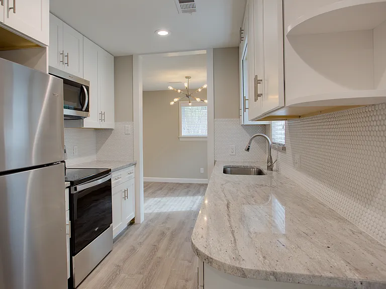 Kitchen leading to dining room