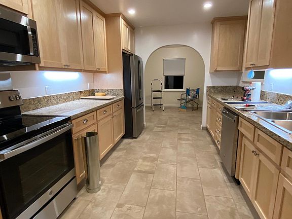 kitchen granite countertops, new cabinets, dishwasher, oven, microwave, fridge