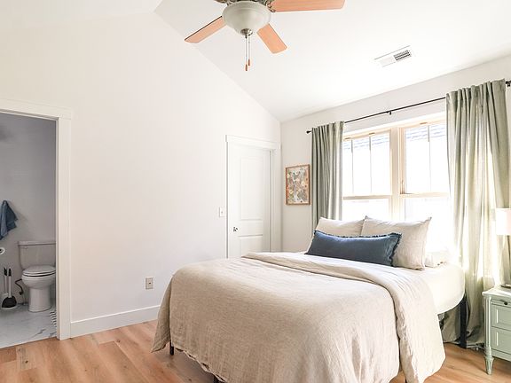 Master bedroom includes a private en_suite bathroom and large closet.