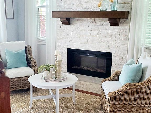 Sitting/living area with electric fireplace