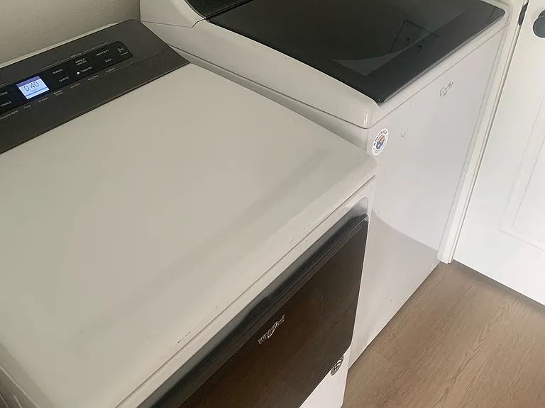 Convenient laundry area with full_size washer and dryer included.