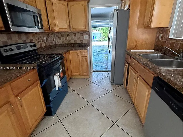 2988 NW 7th Ct — Photo 2