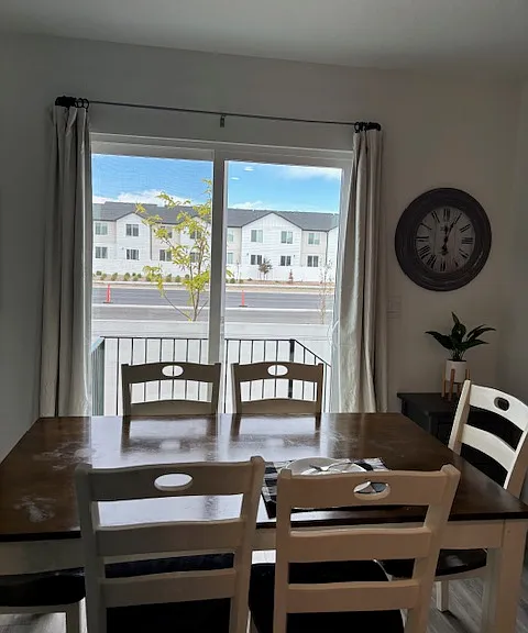 View out back sliding door to patio