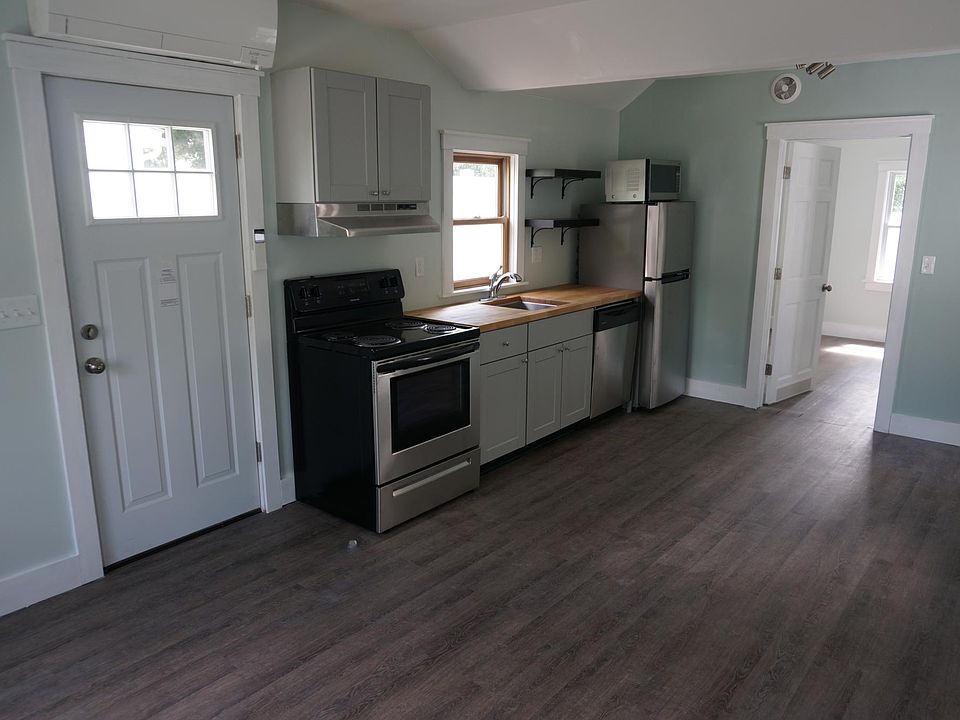 View of kitchen & entry door