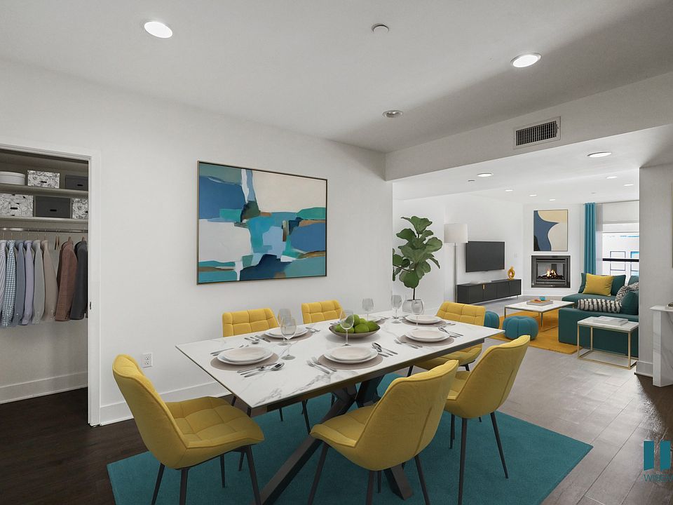 Dining and Living Room with Hall Closet, Fireplace, Vinyl Flooring, and Recessed Lighting