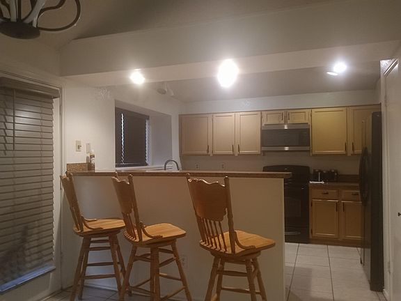 View of kitchen from dining room