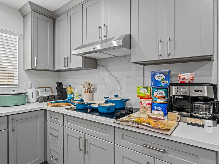 Modern design meets daily comfort_fully stocked counter space for your cooking and sipping needs.