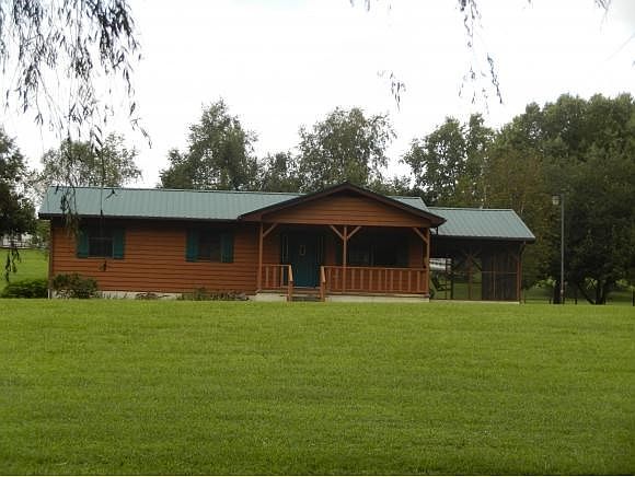 Cedar SidingMetal Roof