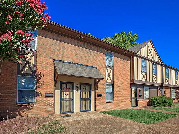 Embrace the warmth of this inviting townhouse, perfect for modern living.