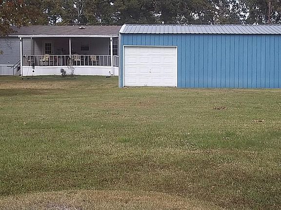 BACK OF LOTS WITH 30X40 STORAGE SHED FOR ALL TOYS