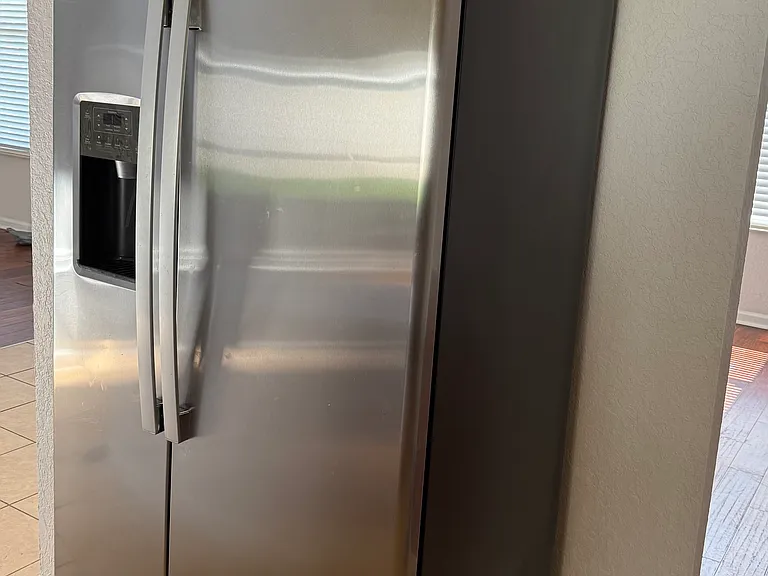 New refrigirator the older one is functional in the garage