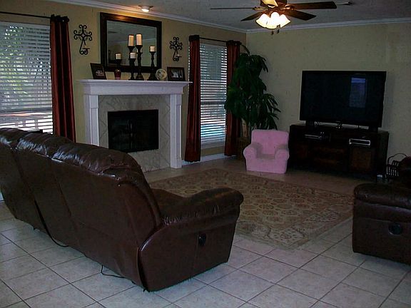 TILE ON LOWER LEVEL, HUGE FAMILY ROOM OVERLOOKS BACK YARD OASIS