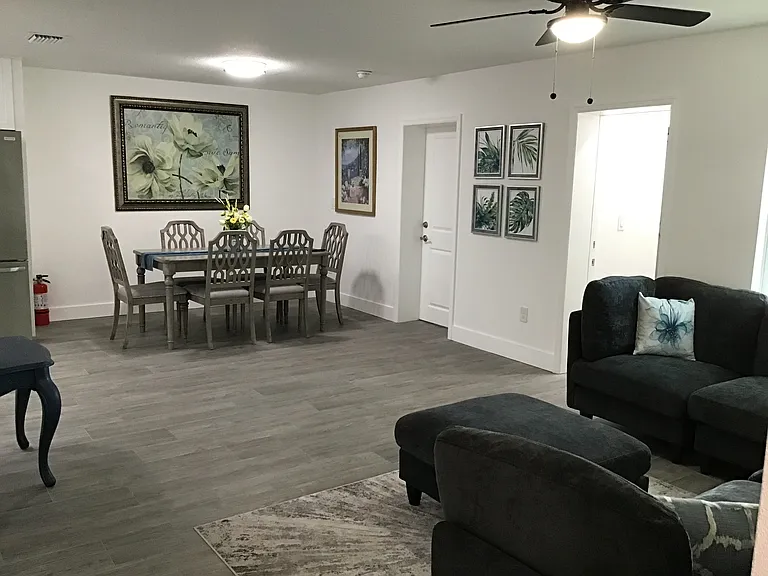 The spacious 24-foot-wide great room offers extensive seating and large screen viewing enjoyment.