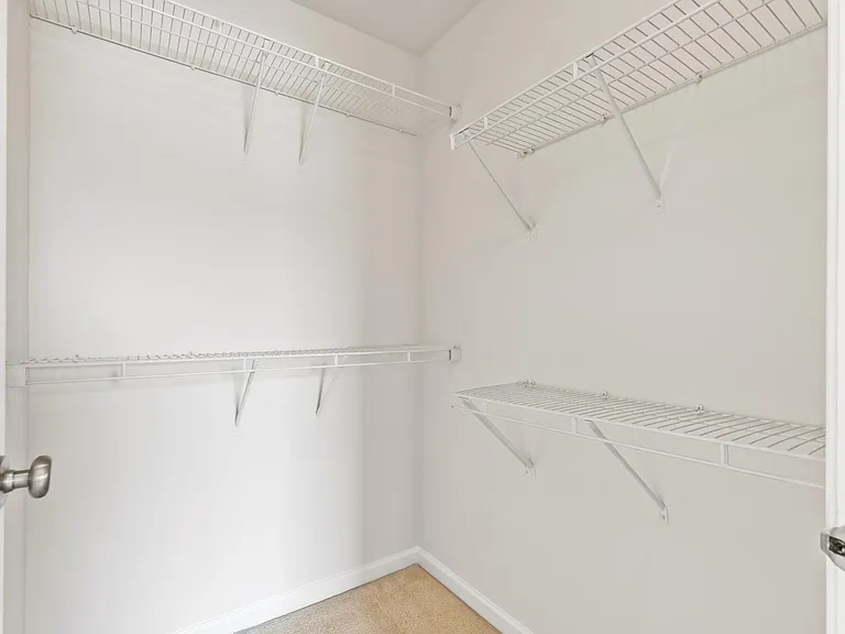 Primary Suite Walk in closet