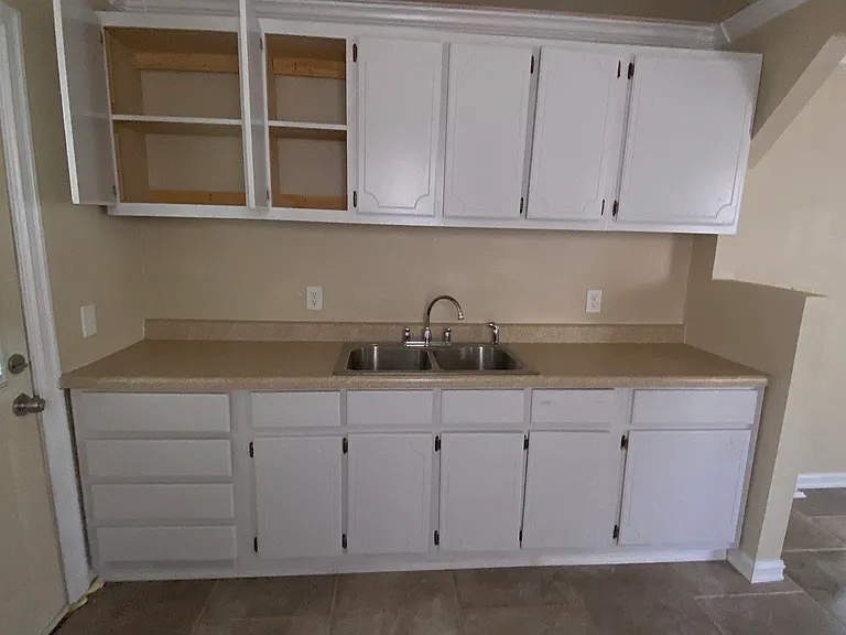 White cabinetry in kitchen