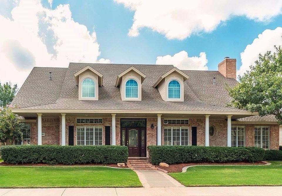 One of the most attractive curb appealing homes on the block!  Quiet cul-de-sac gives opportunity for enjoying the long covered porch. Well manicured lawn and flower beds.  Steps and porch are beautifully stained.
