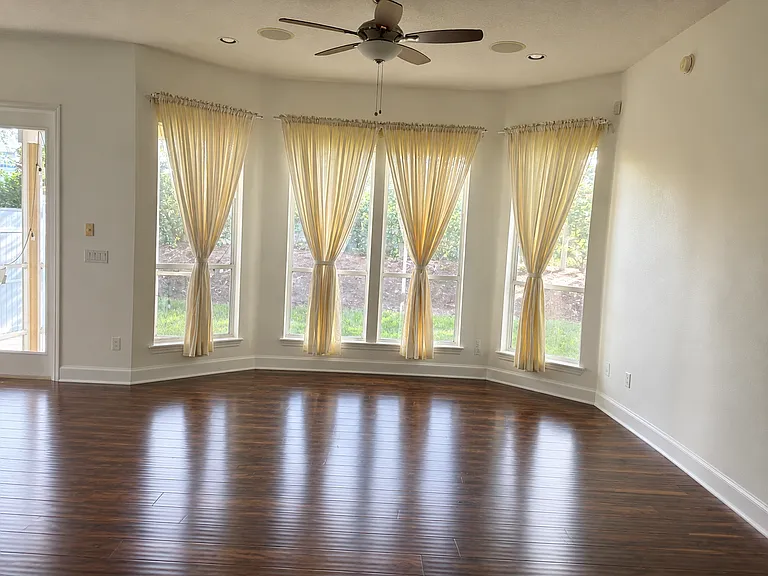 Living Room/Family Room. Curtains stay.