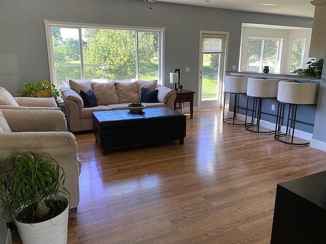 Living Room, windows overlooking the golf course.
