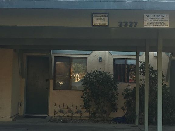 2 car carport at back door.