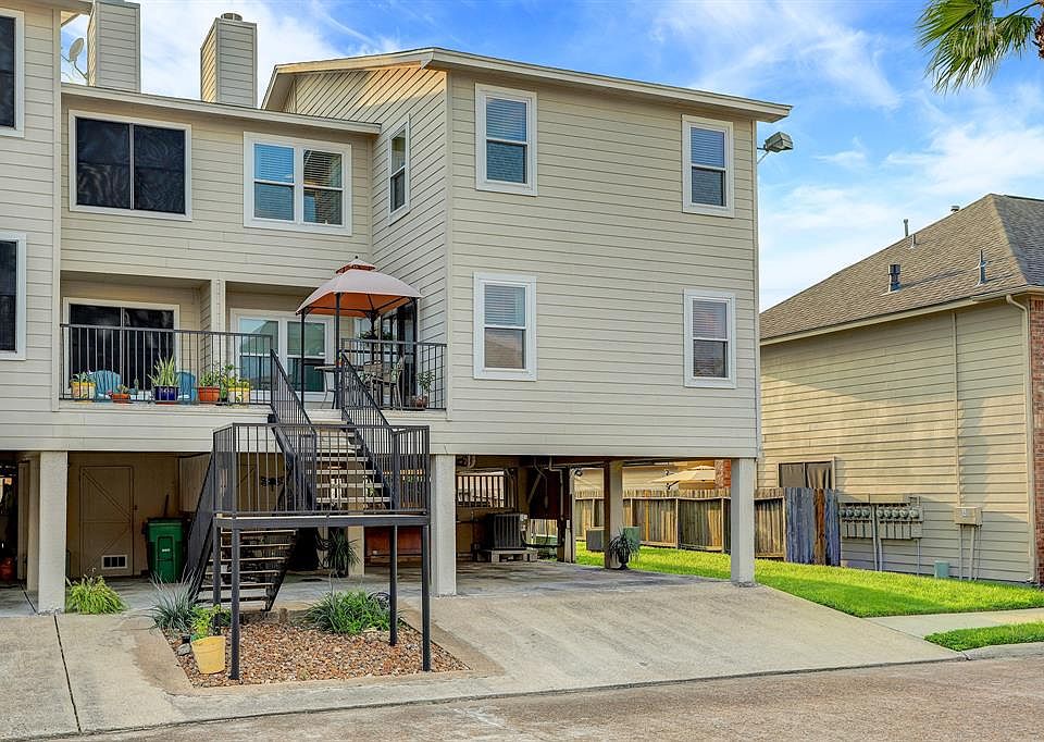 FRONT ELEVATION HIGHLIGHTS THE COVERED SITTING AREAS, COVERED PARKING FOR YOUR VEHICLES AND TOYS, DOUBLE PANE WINDOWS AND LOW MAINTENANCE HARDIPLANK SIDING.